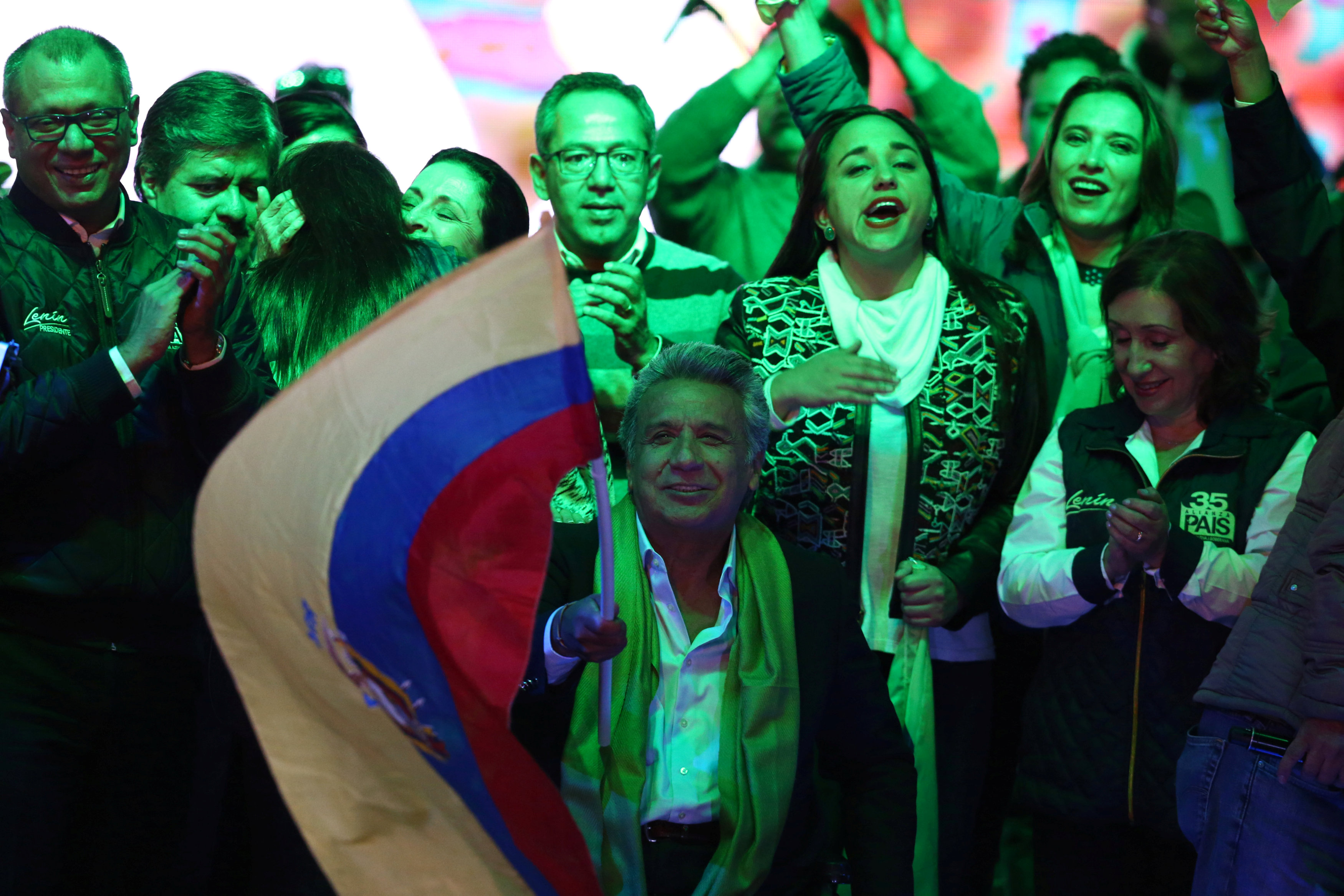 Ecuadorean presidential candidate Lenin Moreno and supporters wait for the results of the national election in a hotel in Quito